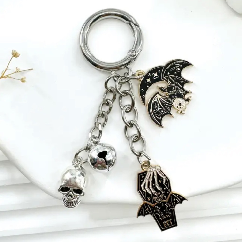 Gothic Coffin & Bat Charm Keychain – Skeleton Hand, Skull, and Moon Details